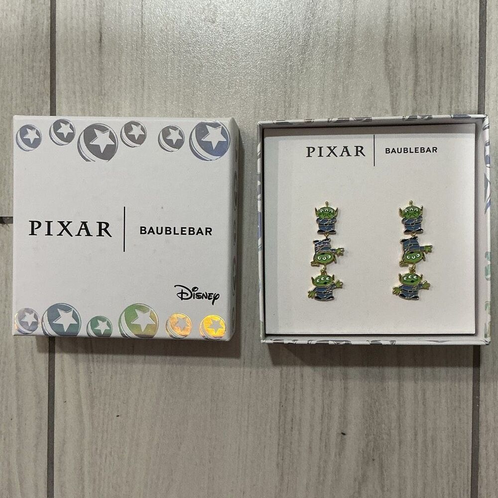 BaubleBar Disney Pixar Toy Story Alien drop earrings, featuring three interconne